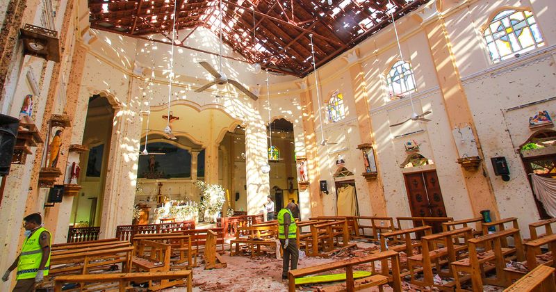 Video shows Sri Lanka bombing suspect pat a girl on the head just before he walks into church