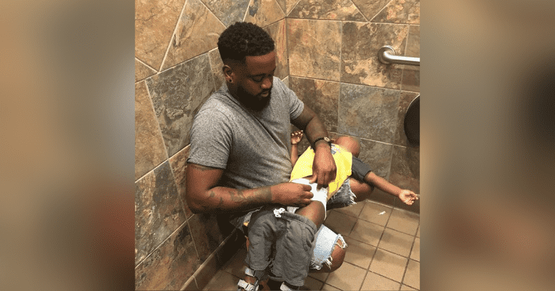 Pampers to install 5,000 baby changing tables in men's restrooms after viral image of father struggling to change son's diaper sparks outrage