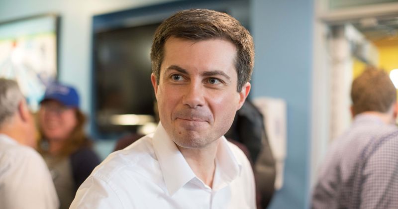 Mayor Pete Buttigieg branded a 'traitor' and heckled during town hall meeting after South Bend police shooting