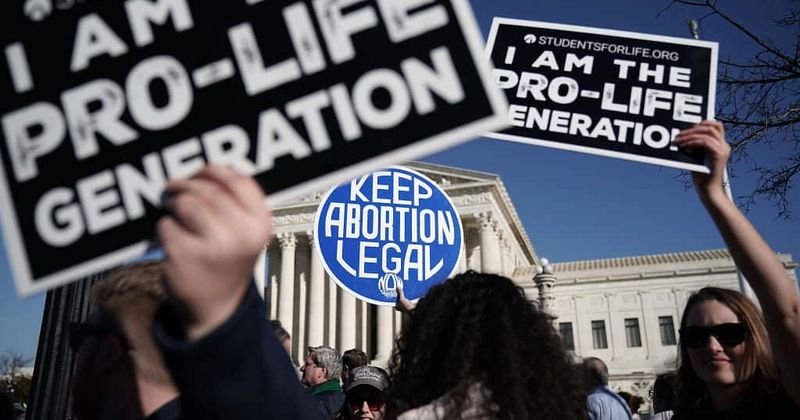 Iowa governor signs 'fetal heartbat' law, banning nearly all abortions in state