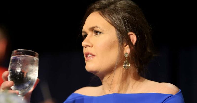 Sarah Huckabee Sanders chokes up when a child asks her about school shootings