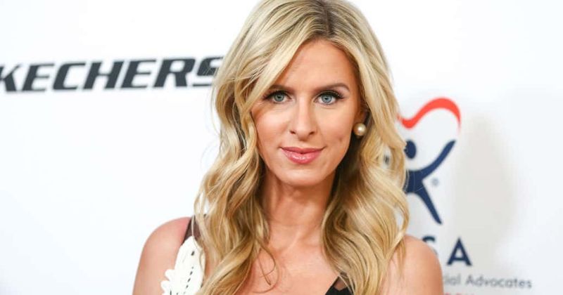 Nicky Hilton Rothchild looks stunning in a hot pink gown as she makes an appearance at the Valentino show