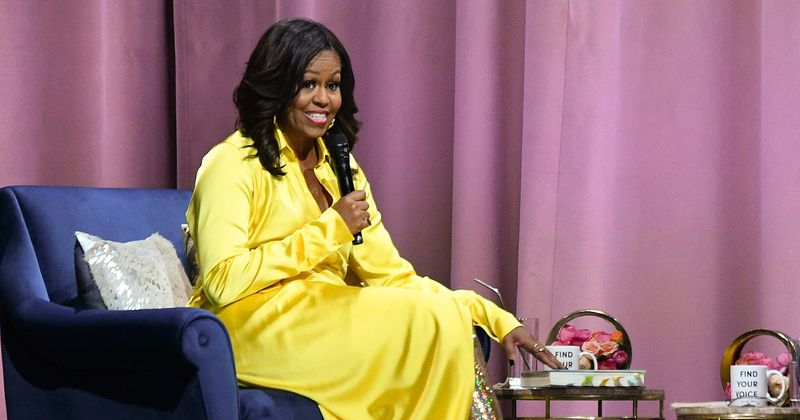 Michelle Obama shows off incredibly toned midriff in workout photo leaving fans wowed: 'That's what a woman should look like'