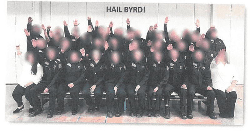 West Virginia prison employees suspended after guard trainees photographed doing Nazi salutes in official group photo