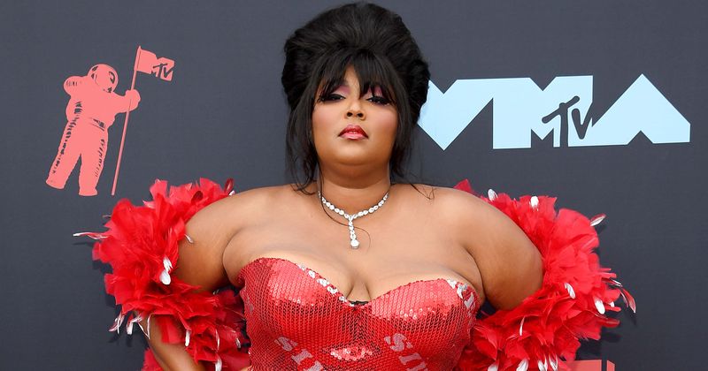 Lizzo shows off cleavage in leopard Savage x Fenty robe after slamming body-shaming troll on social media