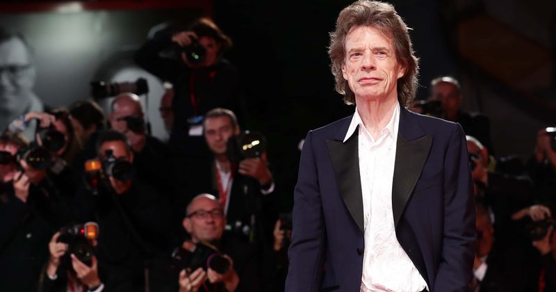 Mick Jagger's brother reveals singer was 'lucky to be alive' because heart condition was detected during a routine scan