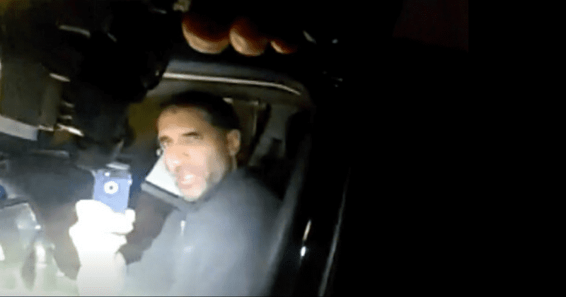 Colorado cop caught pointing gun at doctor's head without provocation as he tried to park on his own property
