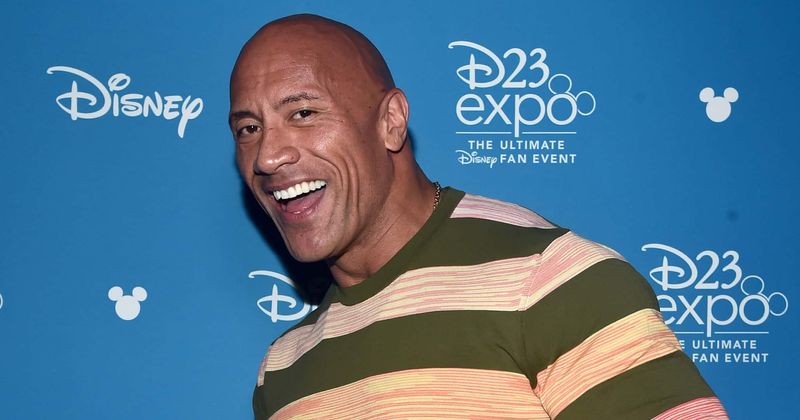 Dwayne 'The Rock' Johnson flaunts tattooed body in pool with daughters, fans love his 'beefed-up' physique