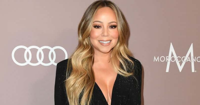 Mariah Carey struggled growing up bi-racial, says she's not 'thrilled to be this skin tone all the time'
