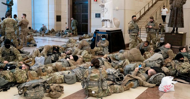 Why were National Guardsmen made to sleep on garage floor? Soldier says 'we were deemed useless' as pics go viral
