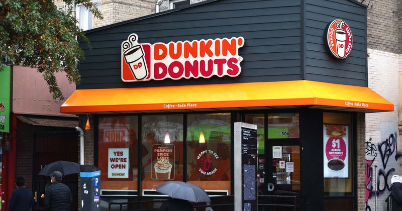 Dunkin’ Donuts employee in viral video showing him throw food as waste fired as he 'gave it to the homeless'