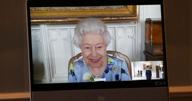 Queen back to work after Prince Philip’s funeral, no longer donning black as she hosts dignitaries virtually