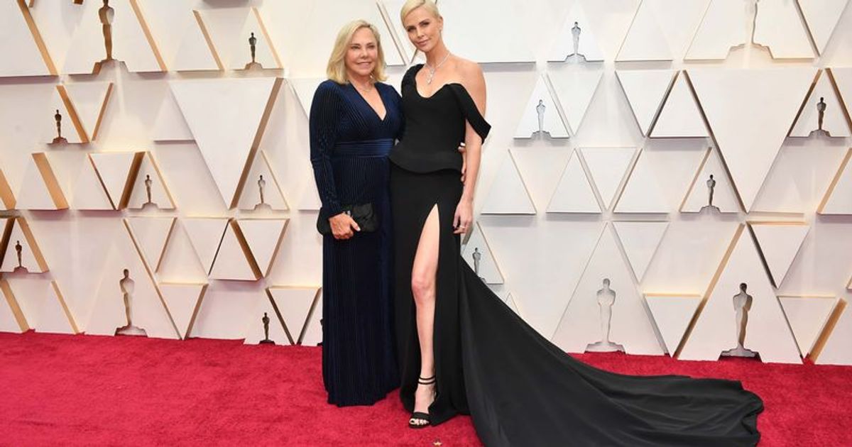 Charlize Theron looks stunning as she takes dip in the waters of Cabo with mom Gerda