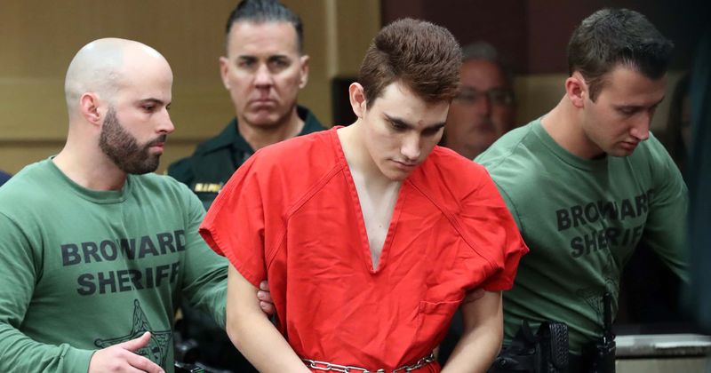 Nikolas Cruz put a MAGA hat in his mother’s grave and LAUGHED about it knowing she 'wouldn't like it'
