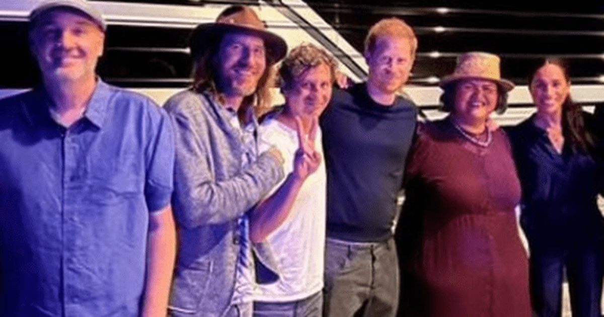 Prince Harry and Meghan Markle pose for photos on date night at concert featuring singer Paula Fuga