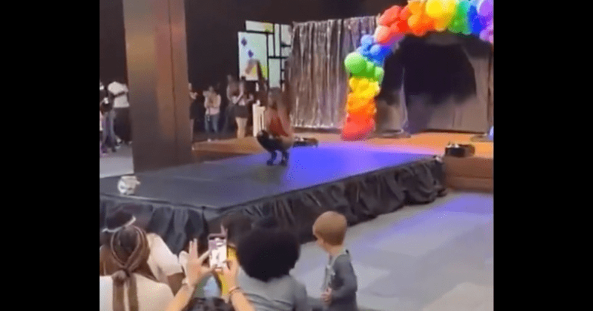 Outrage as drag queen spreads legs and thrusts breasts forward as little kids encouraged to TIP