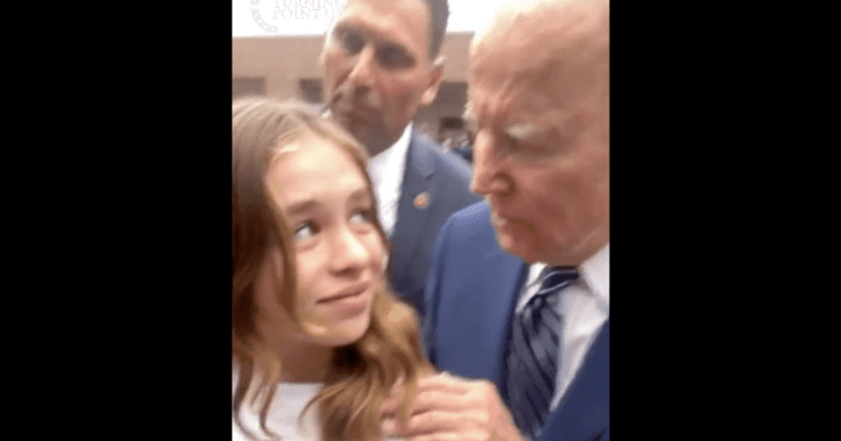 'Handsy and creepy': Joe Biden slammed for 'leaning into' teen and uttering BIZARRE words