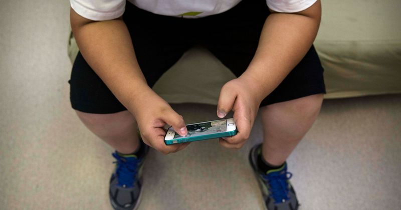 Too much screen time puts children as young as SIX at risk of 'midlife' eye disease, experts warn