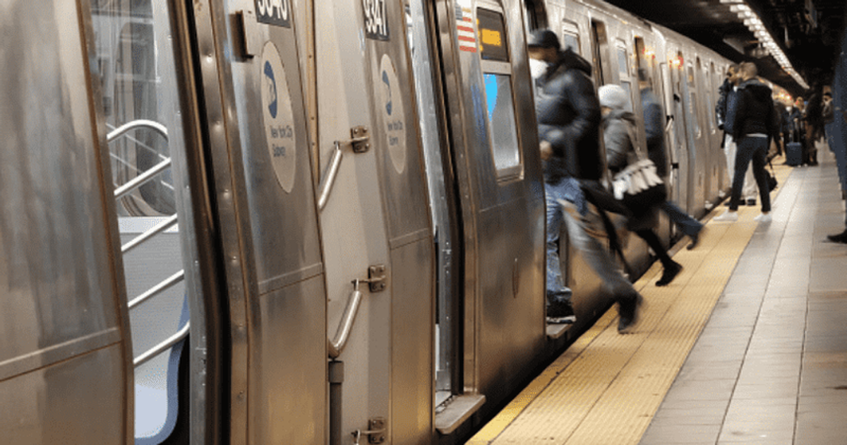 'He took my husband’s life over a phone': Wife of man pushed onto path of NY subway train wants justice