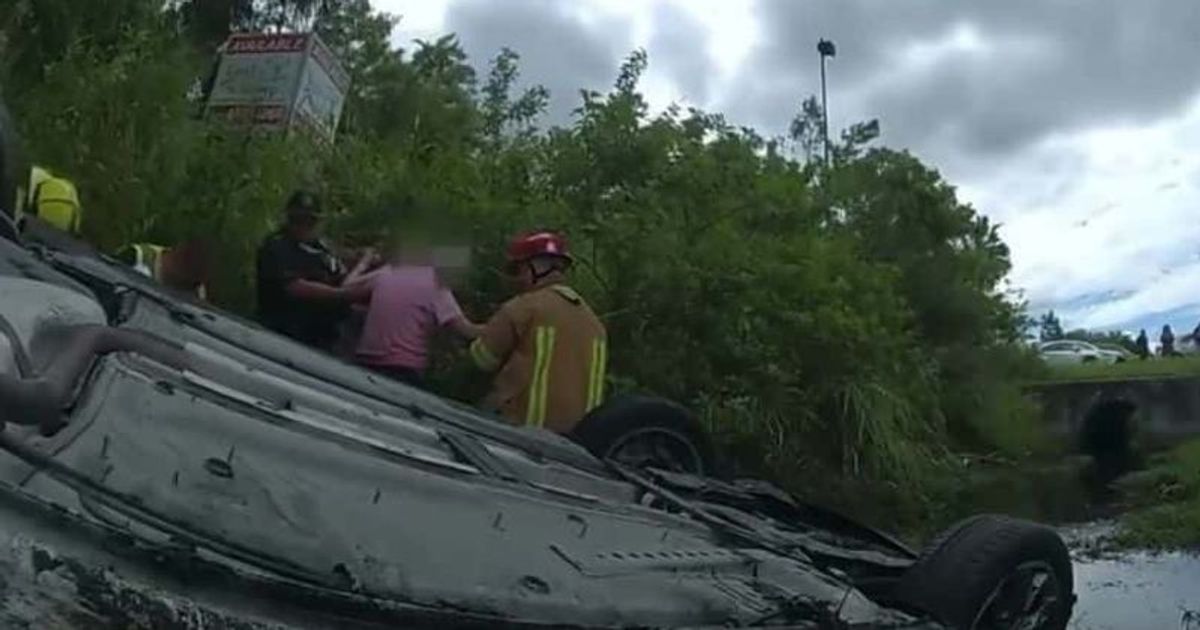 Bodycam captures deputy and Amazon driver rescuing elderly couple and caregiver from submerged car