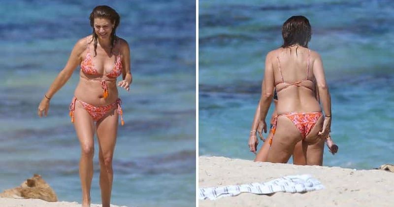 Kate Walsh, 55, flaunts her curves as she hits the beach in stunning floral string bikini