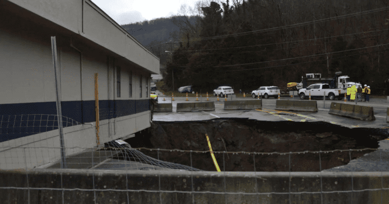 Massive sinkhole threatens to swallow a West Virginia police department as it continues to expand