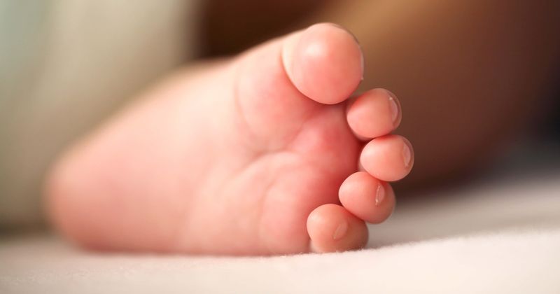 Newborn baby girl survives despite being stuffed in a backpack and thrown into a river off a bridge