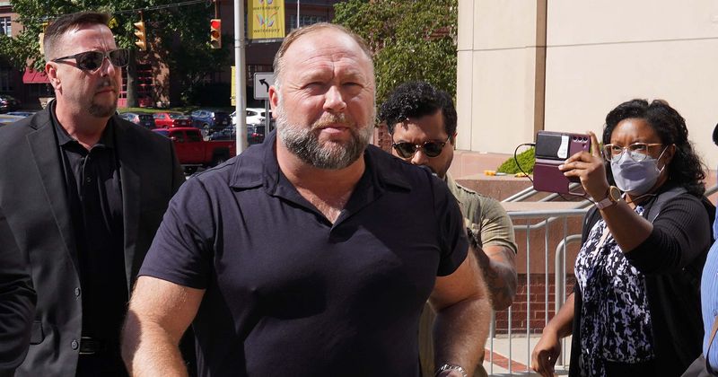 Alex Jones accused of moving money to company run by dad in order to conceal wealth from Sandy Hook families