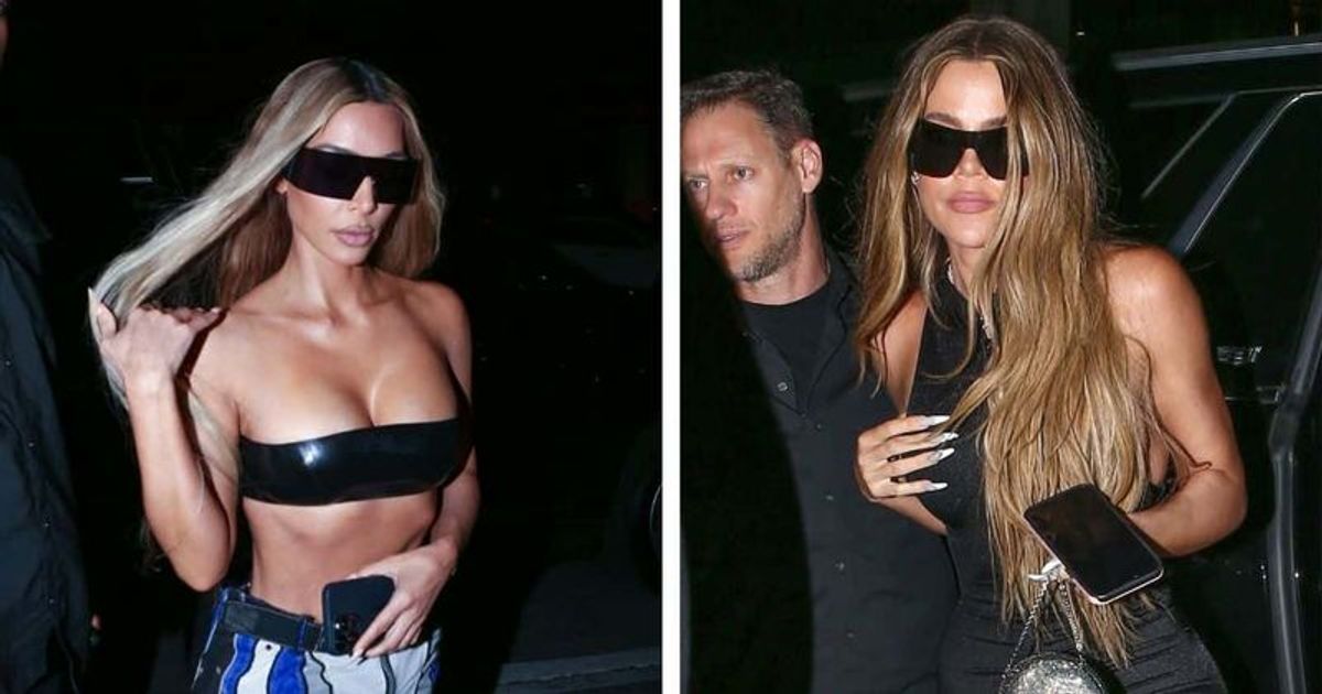Kim and Khloe Kardashian turn heads by flaunting their famous curves as they step out for dinner in Miami