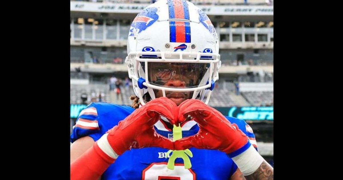 Damar Hamlin: NFL star 'awake' and showing 'remarkable improvement' after cardiac arrest