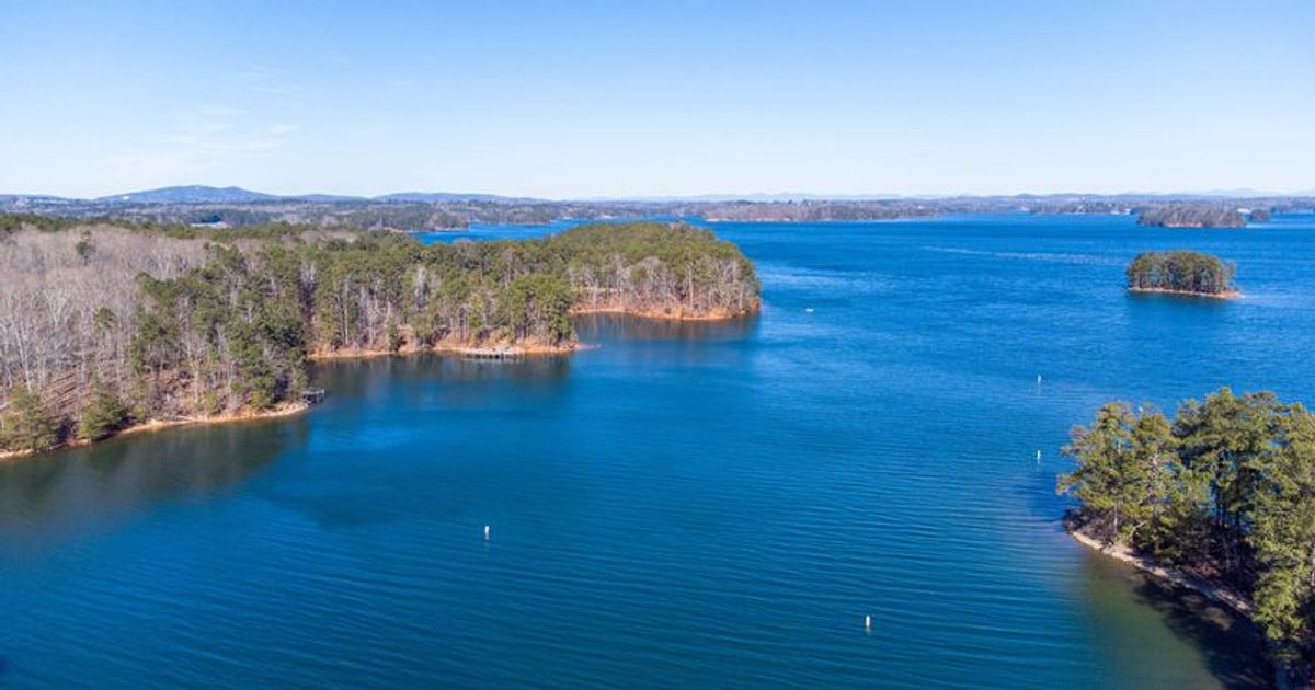 Curse of Lake Lanier strikes again? Two people burned in boat fire at